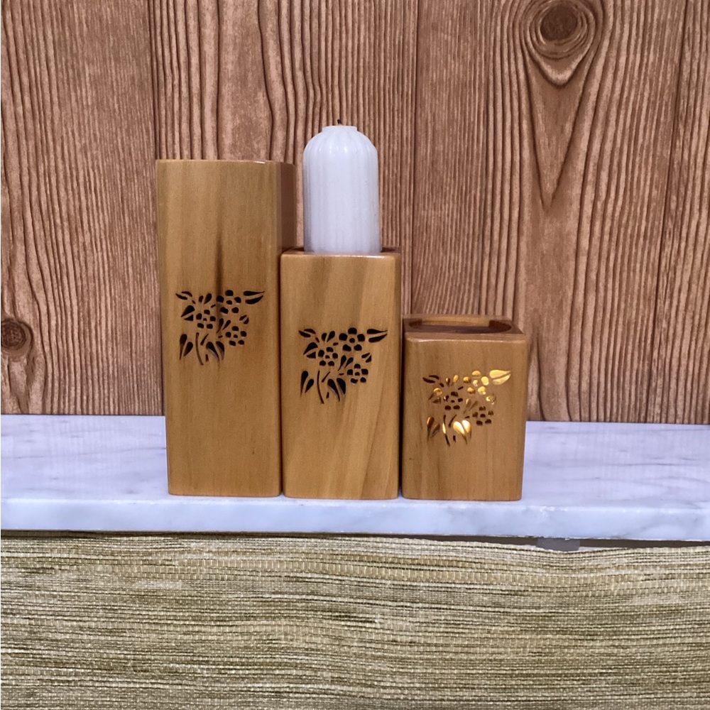 Hand Carved Wooden Graduated Candle Holders with open carving